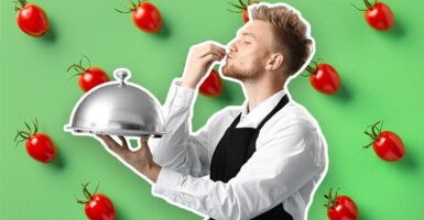 chef with tomatoes in the background