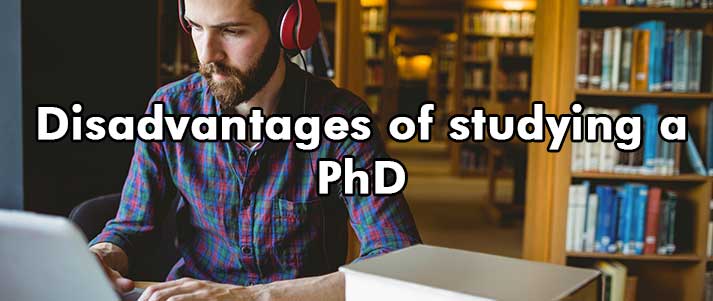 man studying with text 'Disadvantages of studying a PhD'