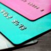 Credit cards laid out on wooden floor