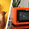 Shocked man and orange microwave
