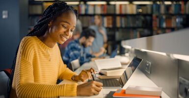 Woman studying in library