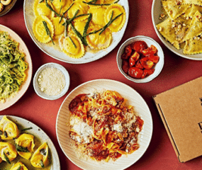pasta dishes and sauce red background